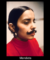 Artist Ana Mendieta in a self-portrait with a drawn-on mustache.